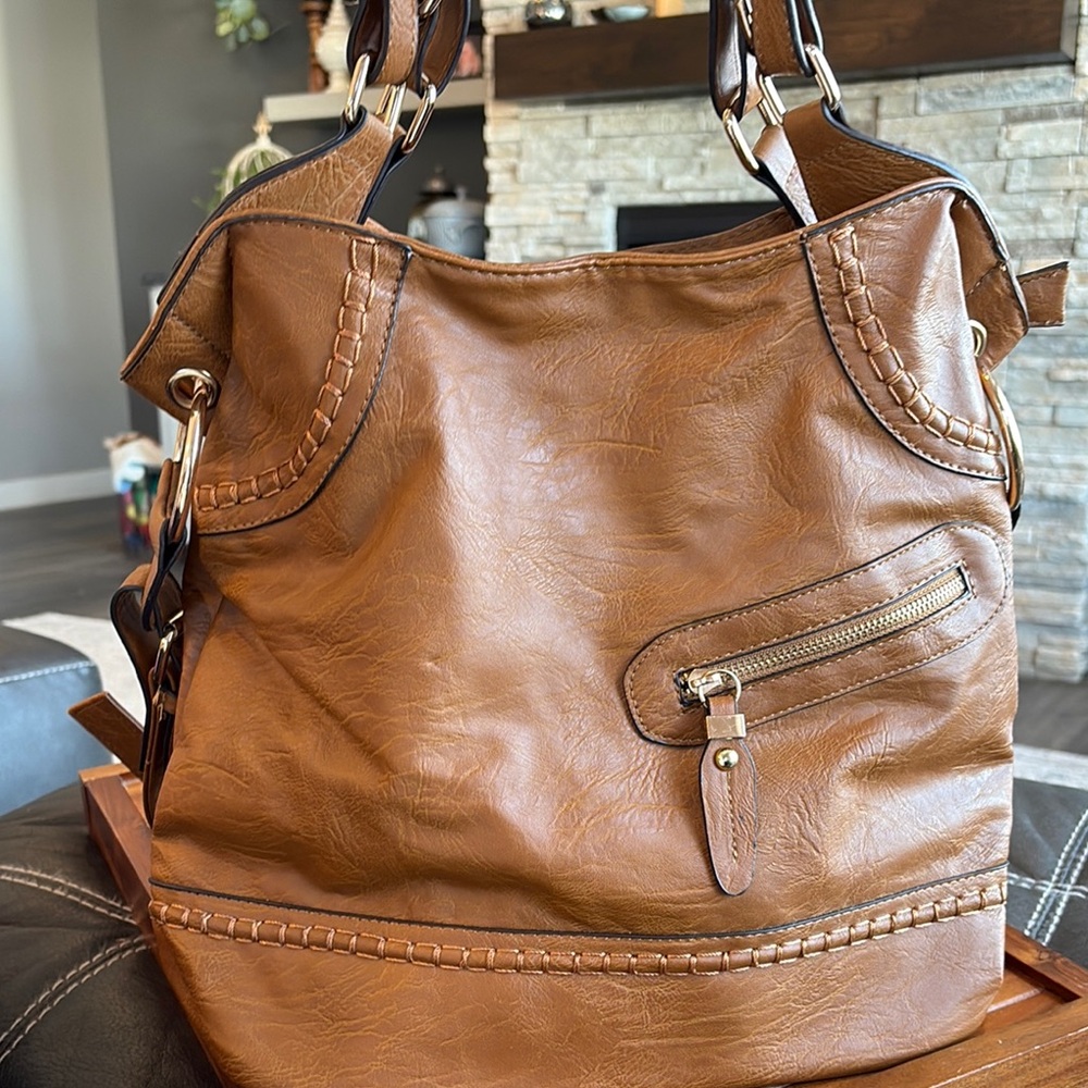 Large Brown Shoulder Bag with Relaxed Structure and Gold Accents
